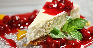 Cheesecake, one of the benchmarks of everywhere cakes with candied fruits all over the world.